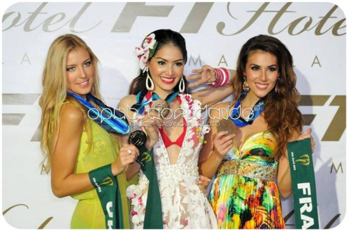 Miss Earth 2013 Resort Wear winners from (L-R) Ukraine (Silver), Thailand (Gold), France (Bronze)